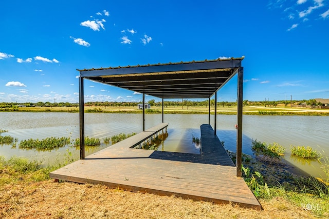 dock area featuring a water view