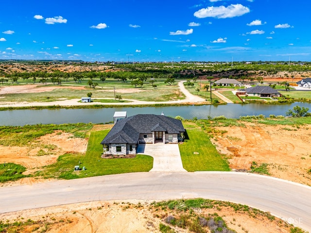 drone / aerial view featuring a water view