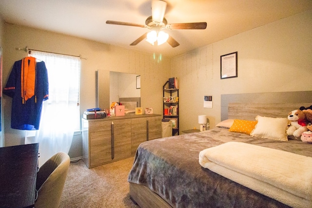 carpeted bedroom featuring a ceiling fan