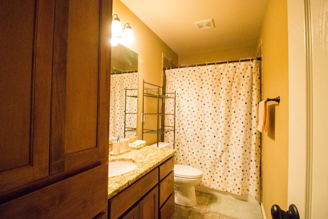 bathroom featuring toilet, visible vents, curtained shower, tile patterned flooring, and vanity