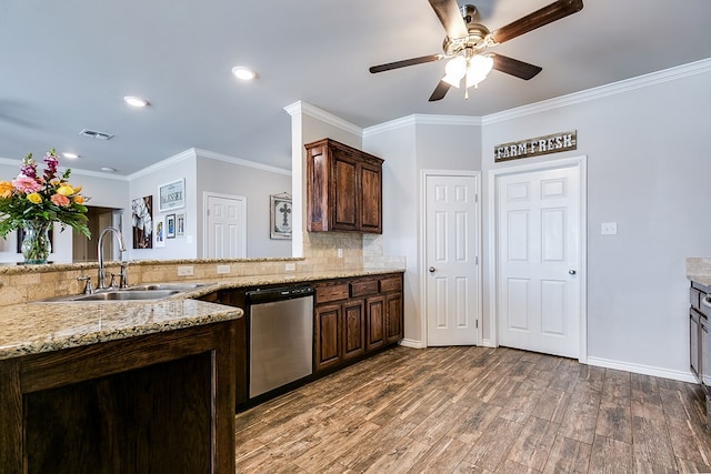 kitchen featuring sink, dark hardwood / wood-style floors, ornamental molding, light stone countertops, and stainless steel dishwasher