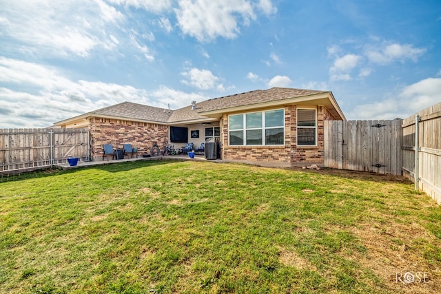 5033 Scarlet Oak Ln, San Angelo, TX 76904 - back of property with brick siding and a patio area