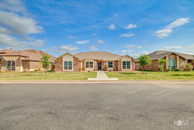 5033 Scarlet Oak Ln, San Angelo, TX 76904 - ranch-style home with a front yard