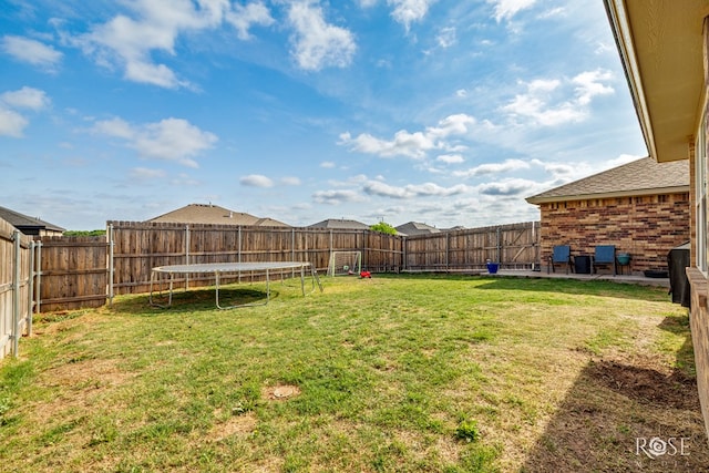 5033 Scarlet Oak Ln, San Angelo, TX 76904 - view of yard with a trampoline