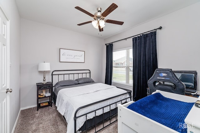 5033 Scarlet Oak Ln, San Angelo, TX 76904 - carpeted bedroom with baseboards and ceiling fan
