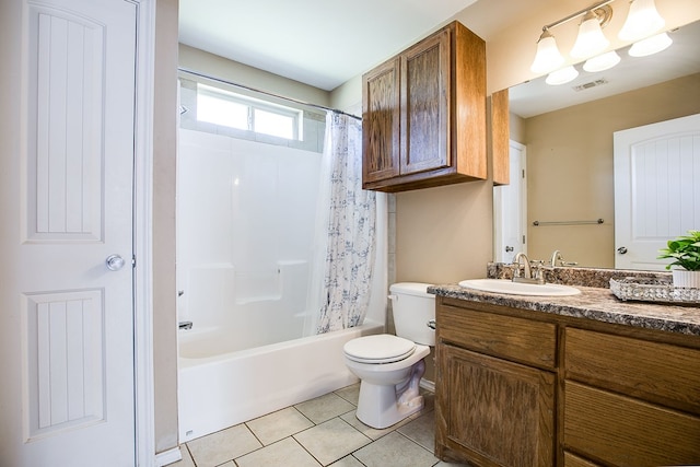 2902 Freeland St, San Angelo, TX 76901 - bathroom featuring vanity, tile patterned flooring, toilet, and shower / tub combo