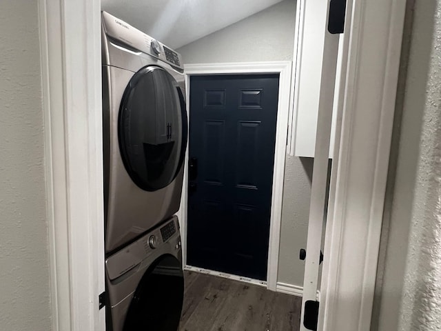 421 Howard St, San Angelo, TX 76901 - washroom with estacked washer and dryer and wood finished floors