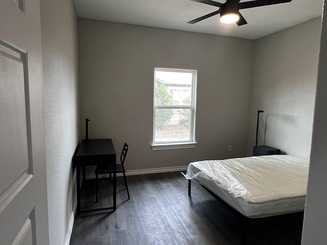 421 Howard St, San Angelo, TX 76901 - bedroom featuring wood finished floors, baseboards, and a ceiling fan