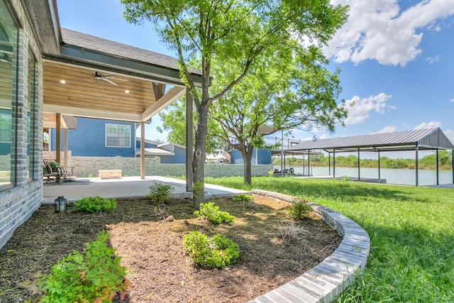 2334 Fishermans Rd, San Angelo, TX 76904 - view of grassy yard with ceiling fan and a patio