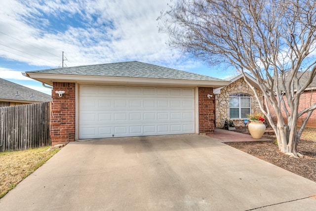 ranch-style home featuring a garage