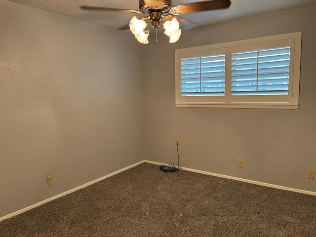 empty room with carpet and ceiling fan