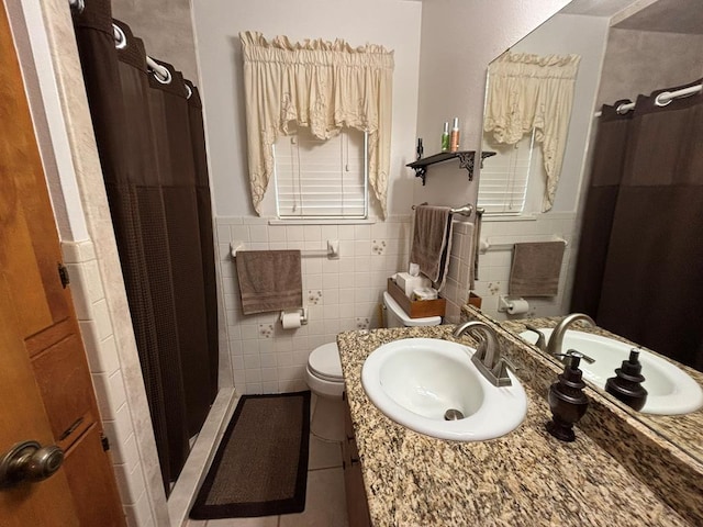 bathroom with vanity, a shower with curtain, and toilet