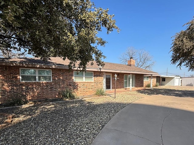 single story home featuring a patio area