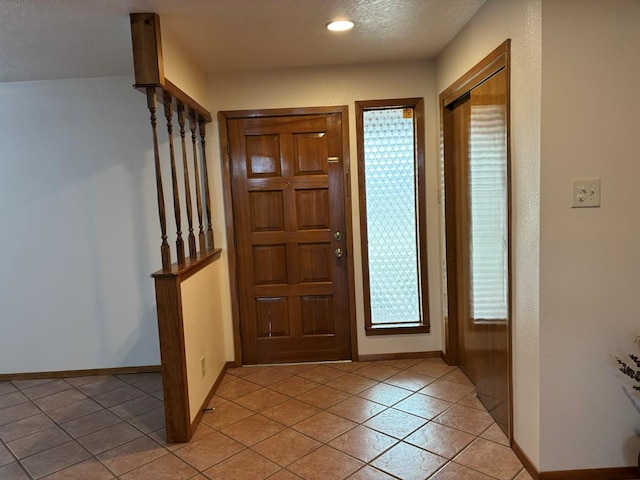 view of tiled foyer