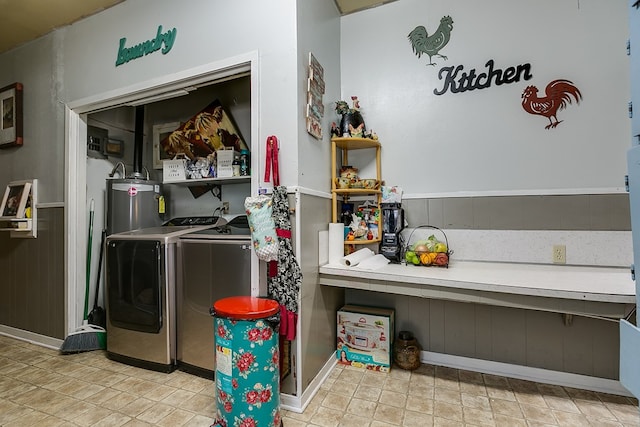 washroom with washer and dryer