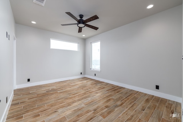 spare room featuring ceiling fan