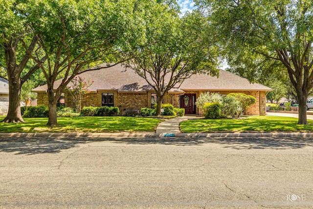 view of front of home with a front yard