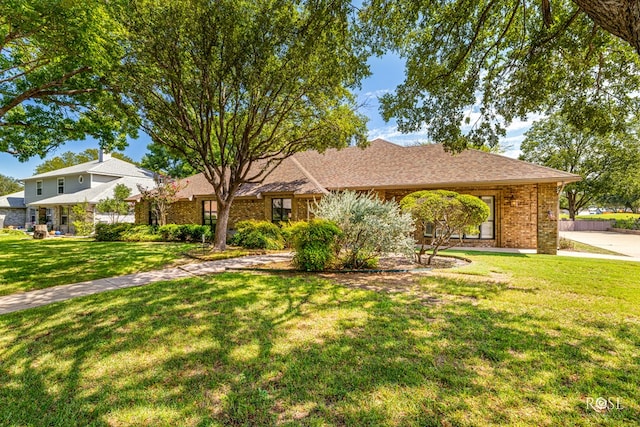 view of front of property with a front lawn