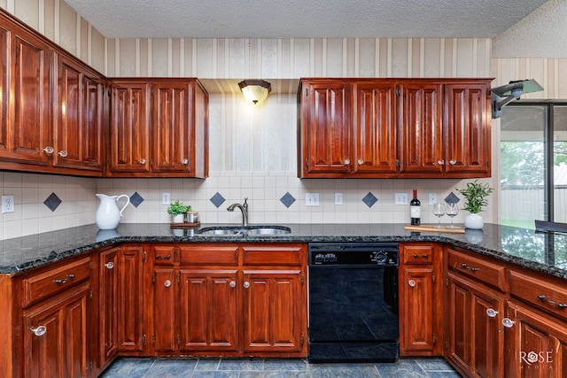 kitchen with backsplash, black dishwasher, sink, and dark stone countertops