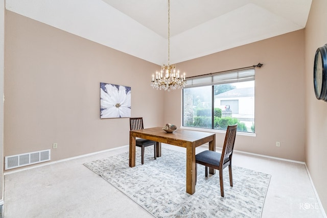 carpeted dining space featuring lofted ceiling and a notable chandelier