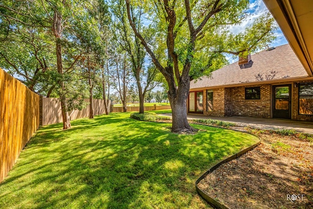 view of yard with a patio area