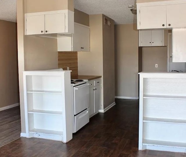 kitchen with a textured ceiling, dark hardwood / wood-style floors, white cabinets, and white range with electric cooktop