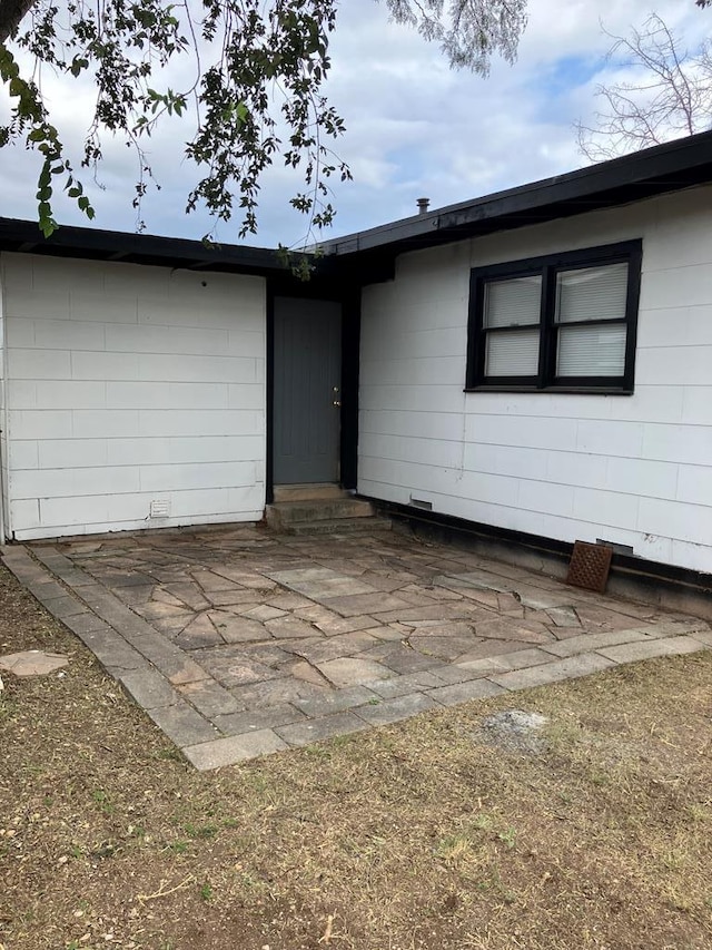 view of front of house with a patio