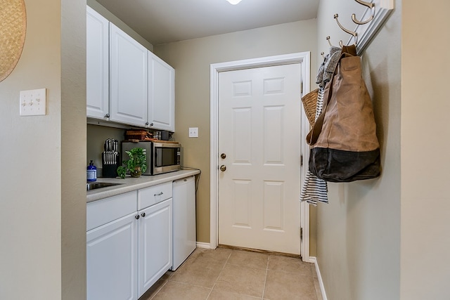 interior space with light tile patterned floors