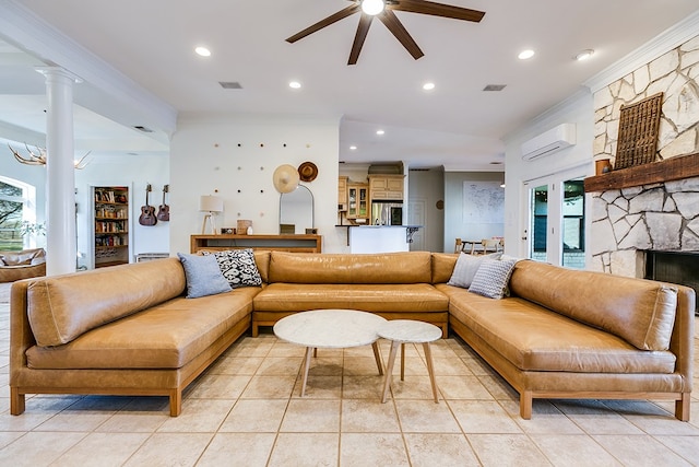 living room featuring ornate columns, ceiling fan, ornamental molding, and an AC wall unit