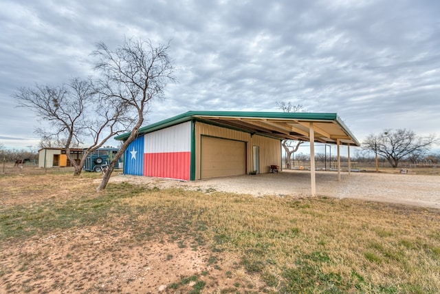 view of outdoor structure with a garage