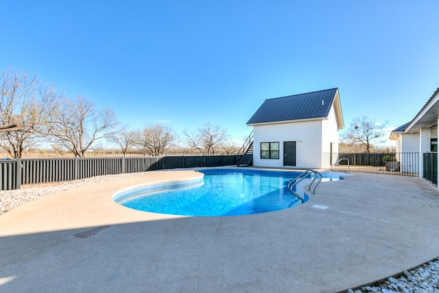 view of swimming pool featuring a patio