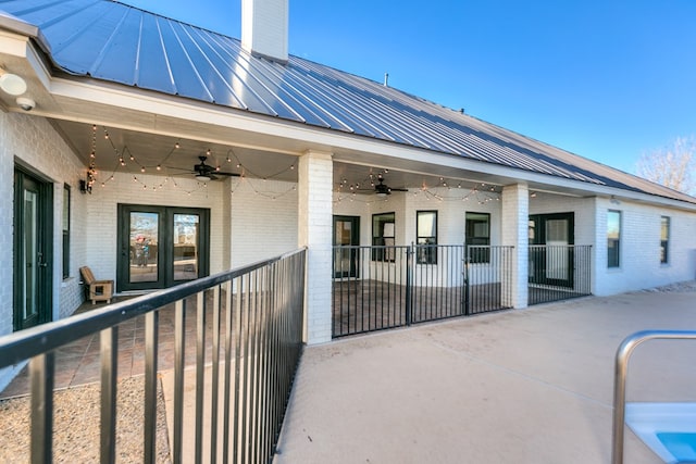 view of patio / terrace featuring french doors and ceiling fan