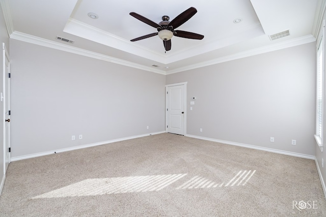 705 Ratliff Rd, Wall, TX 76904 - spare room with a raised ceiling, a ceiling fan, carpet floors, ornamental molding, and baseboards