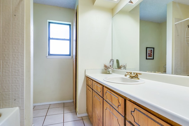 bathroom featuring tile patterned flooring, vanity, and shower / tub combination