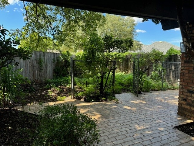 view of patio / terrace with a mountain view