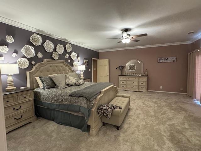 bedroom featuring ornamental molding, carpet, and ceiling fan