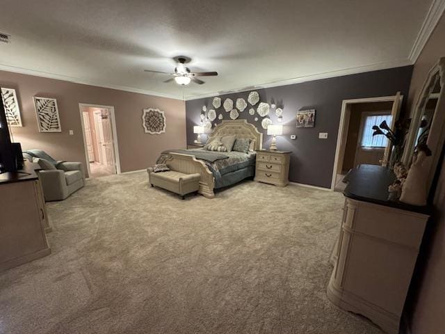 carpeted bedroom featuring crown molding and ceiling fan