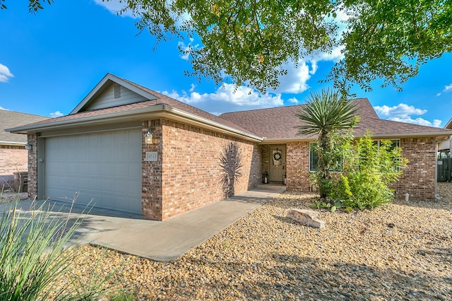 single story home with a garage