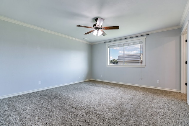 unfurnished room featuring ornamental molding, ceiling fan, and carpet