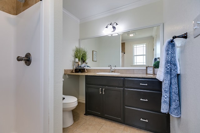 bathroom featuring tile patterned flooring, vanity, ornamental molding, toilet, and walk in shower