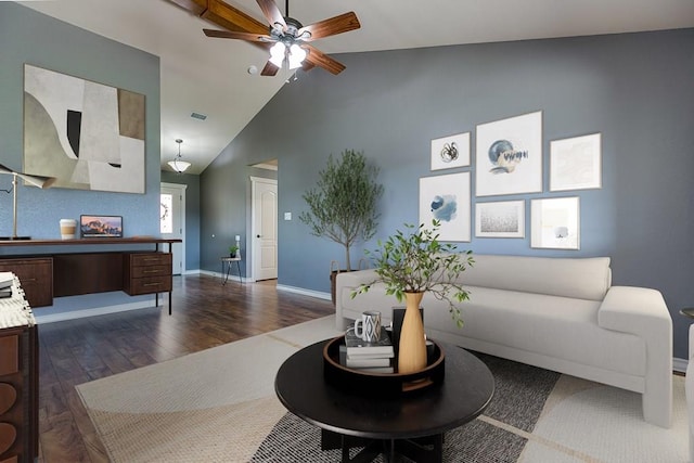 living room with ceiling fan, dark hardwood / wood-style flooring, and high vaulted ceiling