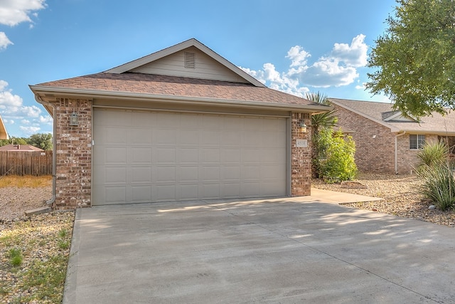 ranch-style house featuring a garage