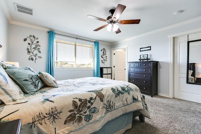 carpeted bedroom featuring crown molding and ceiling fan