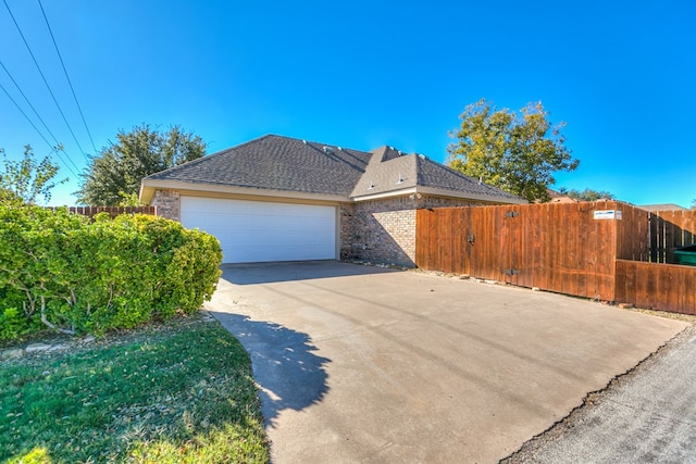 view of side of property featuring a garage