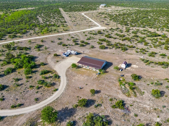 birds eye view of property featuring a rural view