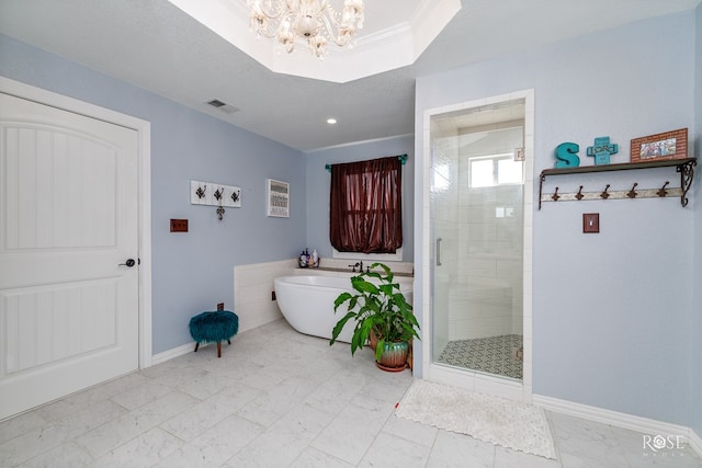 bathroom with shower with separate bathtub, a textured ceiling, a notable chandelier, and crown molding