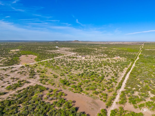 birds eye view of property featuring a rural view