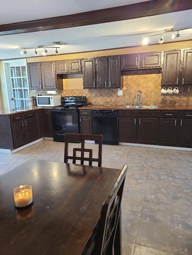 1811 Willow St, San Angelo, TX 76901 - kitchen featuring black appliances, a sink, track lighting, and backsplash