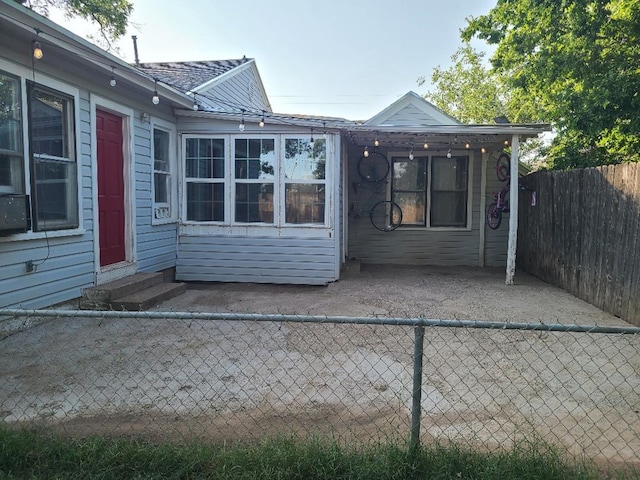 1811 Willow St, San Angelo, TX 76901 - view of property exterior featuring entry steps and a fenced backyard