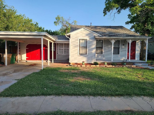 1811 Willow St, San Angelo, TX 76901 - view of front of house featuring a front lawn, driveway, covered porch, and a carport